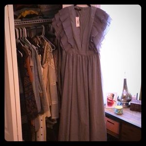 Never worn, grey, flowing gown